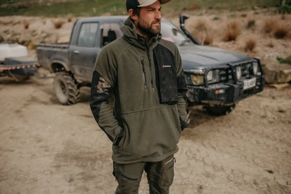 Man in outdoor country clothing wearing Bushbuck Frontier Windproof Fleece Pullover with chest pocket
