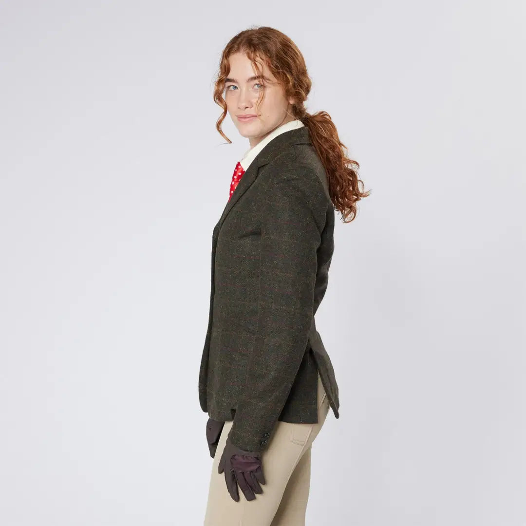 Woman in Cameo Tweed Jacket with foxhead buttons, perfect for country clothing hunting