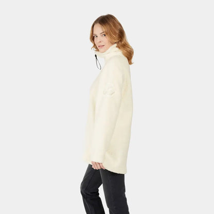 Woman in cream-colored Didriksons Marina Half Zip Fleece sweater