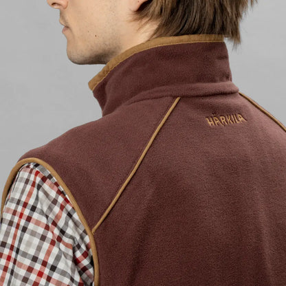 Brown fleece vest with tan trim and HÄRKILA branding, perfect for country clothing and hunting