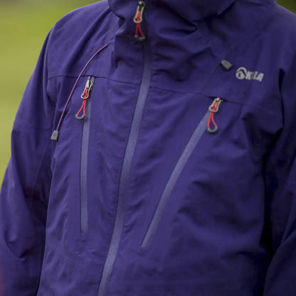 Purple Keela Womens Pinnacle Jacket with zippered pockets, perfect for outdoor adventures