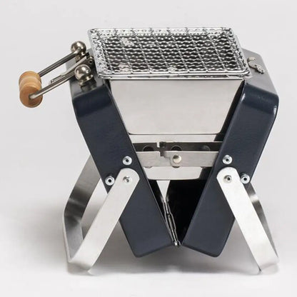 Portable Kenluck Mini Grill perfect for BBQs on the go and outdoor cooking adventures