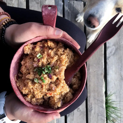 Couscous in a pink Kupilka Bowl with a spork, perfect for outdoor meals