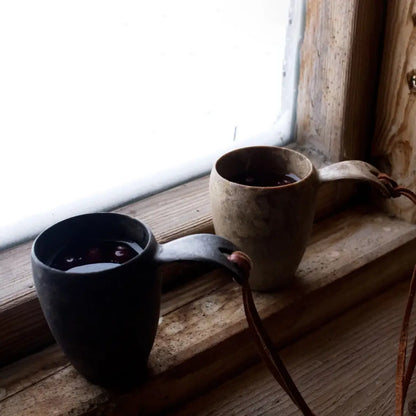 Two Kupilka Shot Cups made from Kareline natural fibre, perfect for outdoor sipping