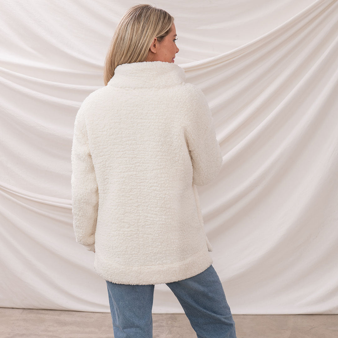 Cream-colored fuzzy quarter-zip pullover from Lighthouse Ladies Bay Fleece collection