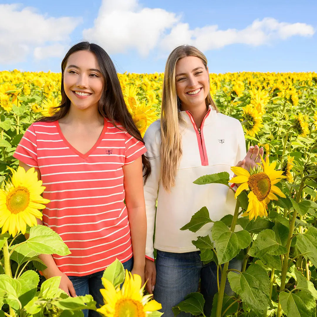 Lighthouse Ladies Shore II Jersey with two women in a sunflower field for a casual look