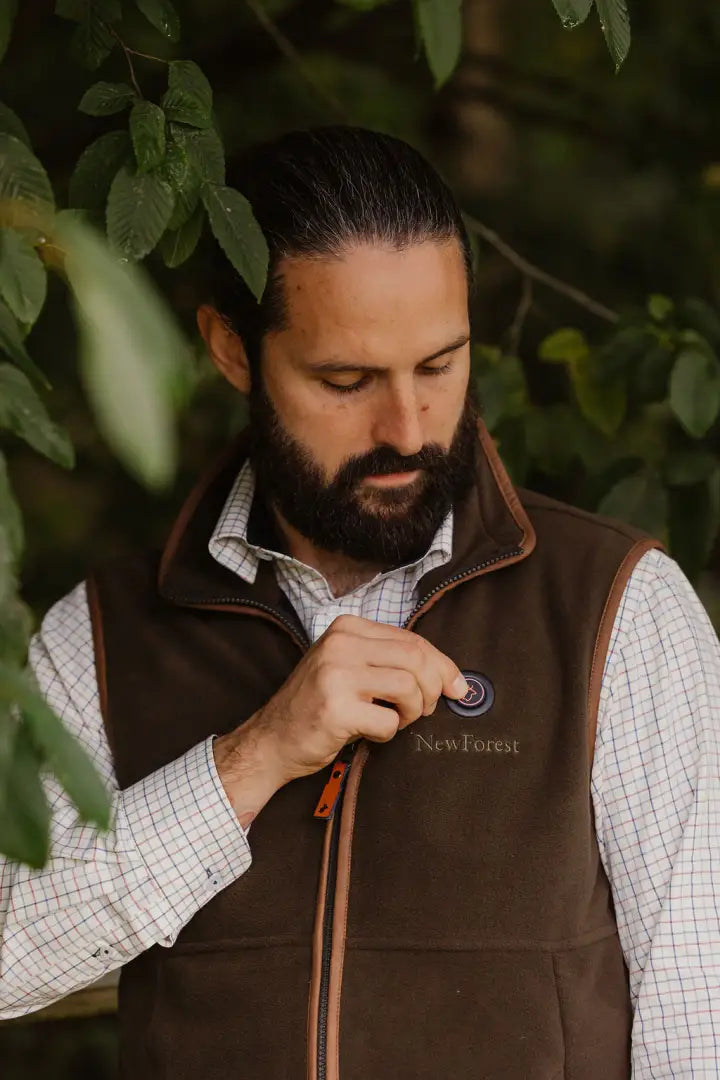 Brown fleece vest of New Forest Heated Fleece Gilet for cozy outdoor adventures