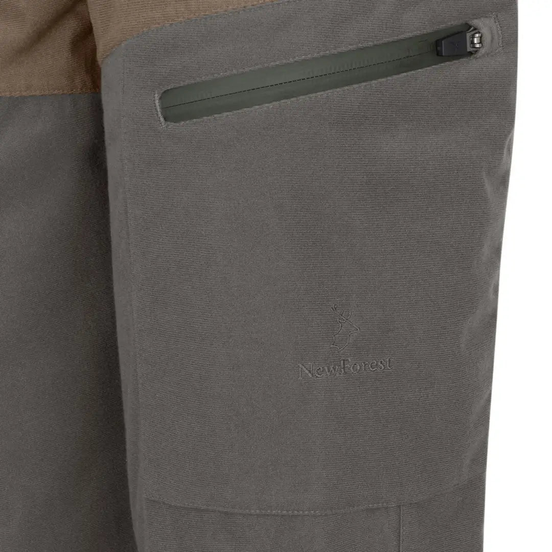 Gray and brown Forest Nightjar Trousers with zippered pocket for hunting adventures