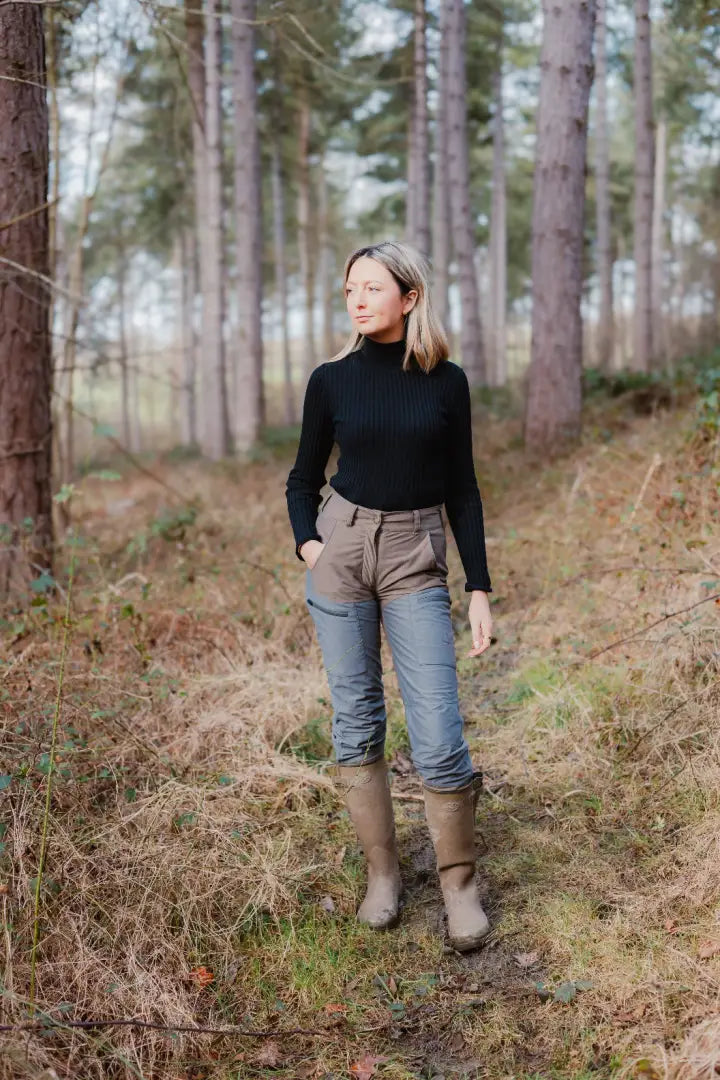 Woman wearing Forest Nightjar Trousers for outdoor adventures