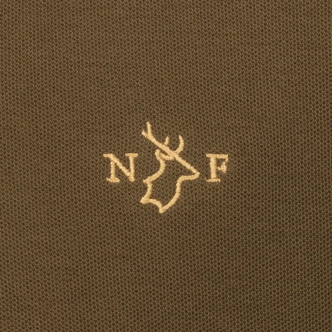 Embroidered deer head logo on New Forest Pique Polo Shirt, perfect for casual style
