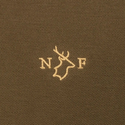 Embroidered deer head logo on New Forest Pique Polo Shirt, perfect for casual style