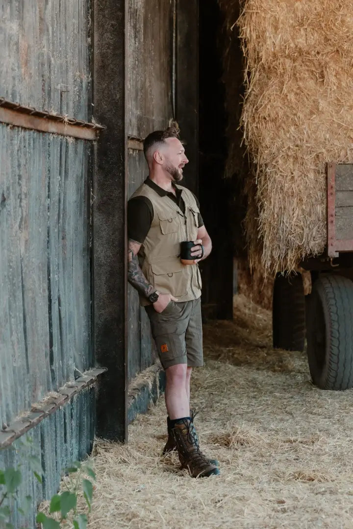 Man in outdoor explorer gilet, perfect for forest explorers and outdoor adventures