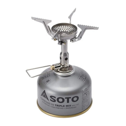 Silver camping stove in the Soto Amicus and New River Pot Combo for outdoor cooking fun