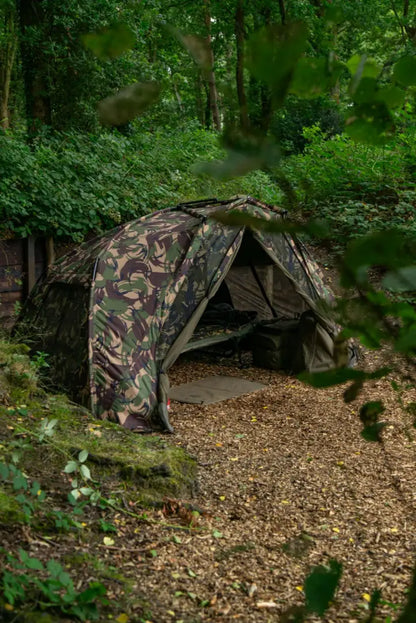Camouflaged camping tent on a Speero Bivvy Mat for stealthy bivvy camping