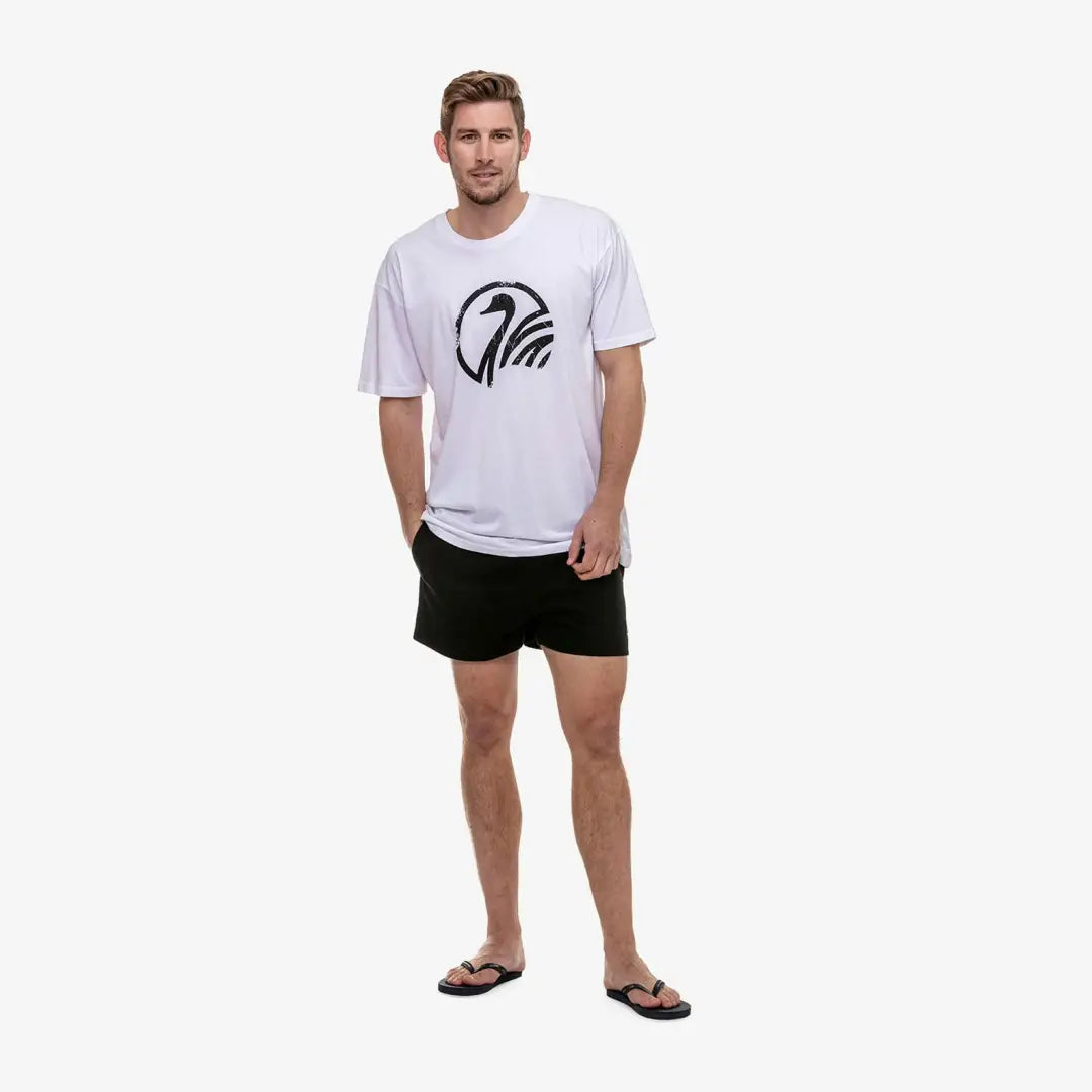 Man in white tee and flip-flops wearing Swanndri Cotton Rugby Shorts, perfect for country clothing