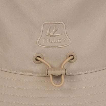 Beige Tilley Logo Technical T1 Bucket Hat perfect for outdoor adventures